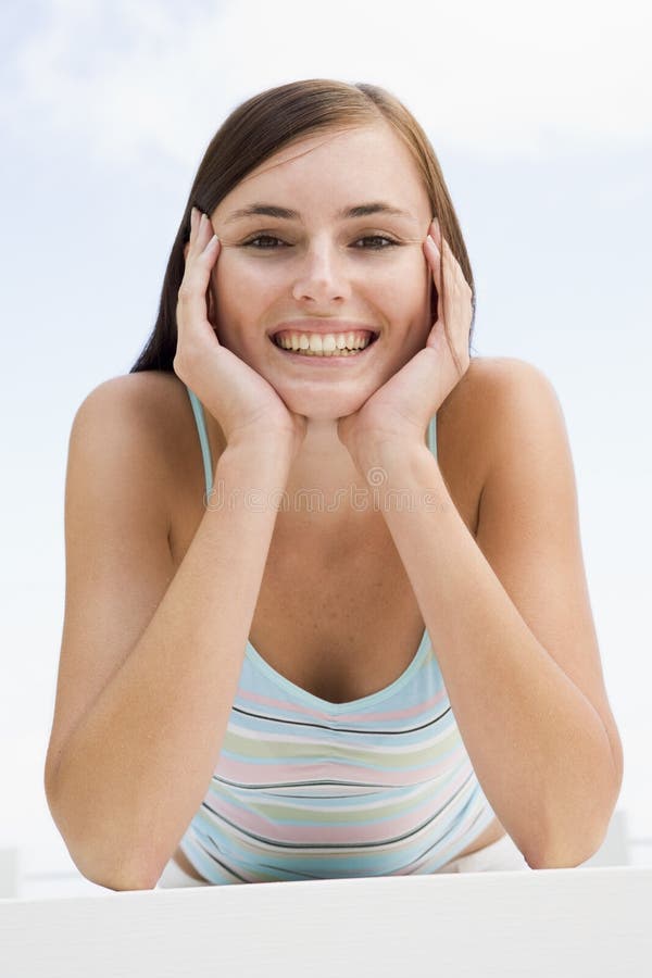 Young woman relaxing outside