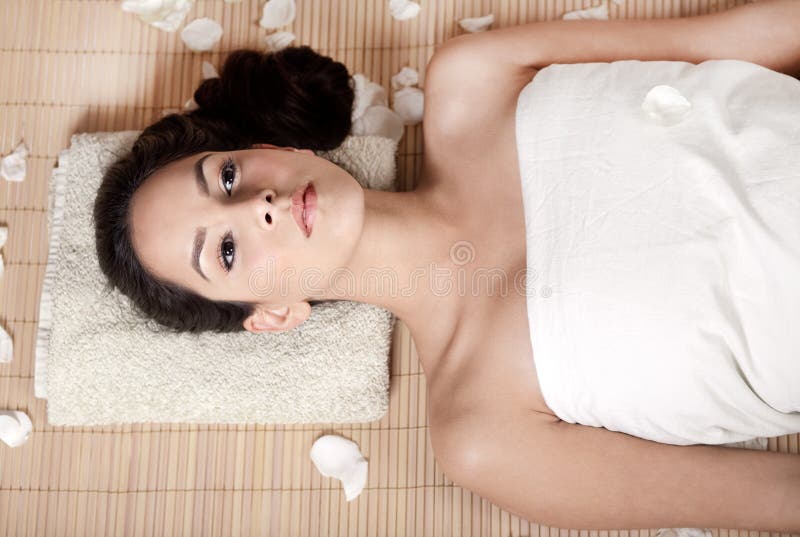 Young woman relaxing and ready for spa treatment