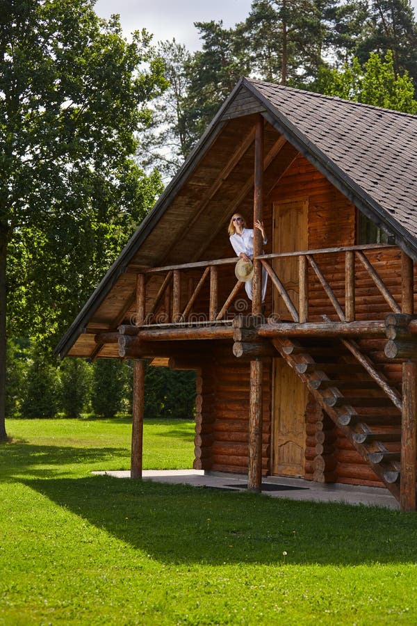 Young woman resting in countyside house. Beautiful young woman resting in countyside house. outdoor shot copy space royalty free stock photos Young woman resting in countyside house. Beautiful young woman resting in countyside house. outdoor shot copy space royalty free stock photos