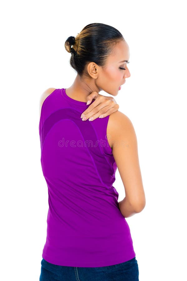 Woman rubbing aching back stock photos Woman rubbing aching back stock photos
