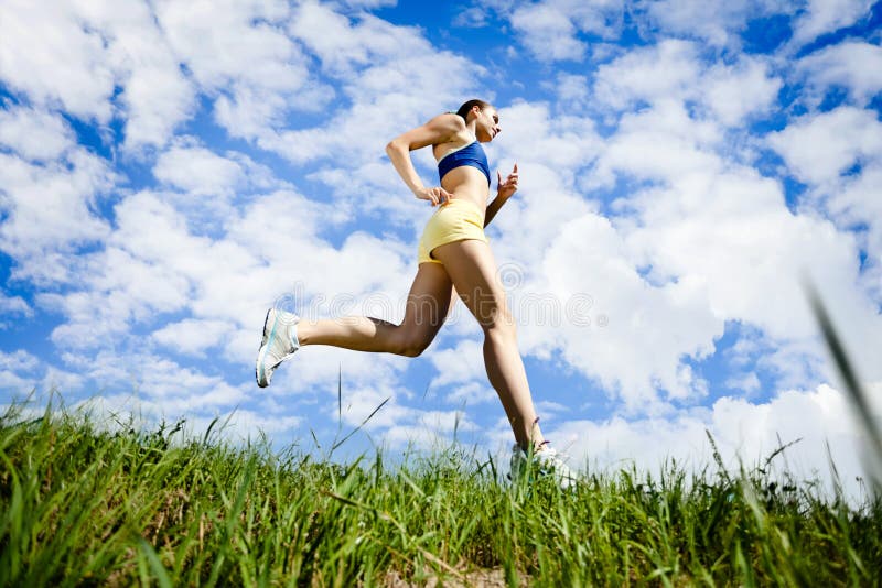 Young woman running outdoor royalty free stock images