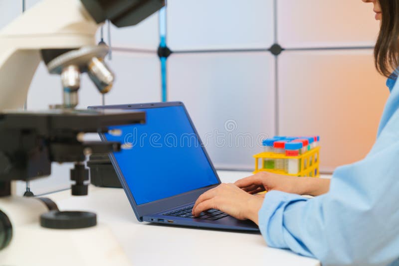 Young Woman in a Science Lab. Health Care Researchers Working in Life ...