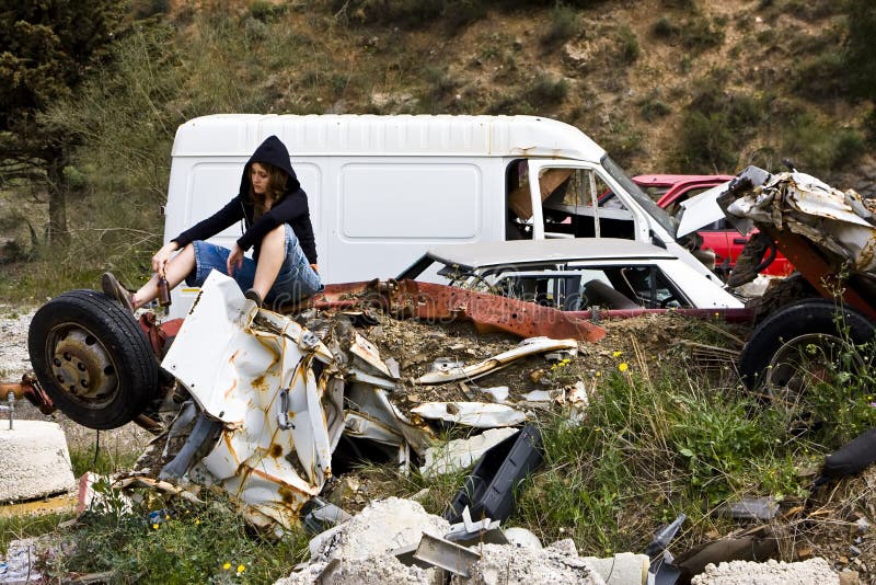 Young woman in the scrapyard