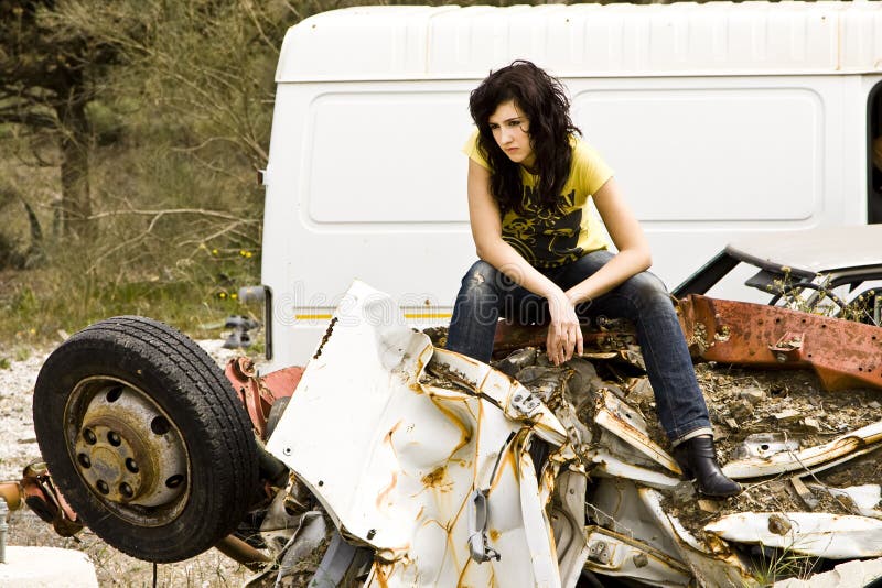 Young woman in the scrapyard