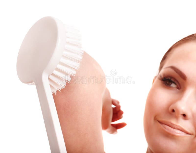 Young woman scrubbing body. royalty free stock photo