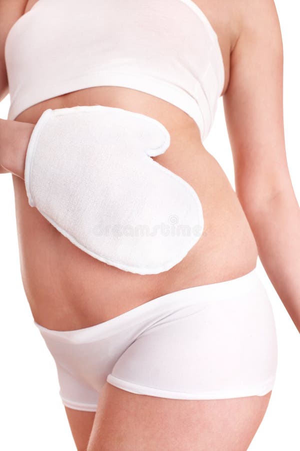 Young woman scrubbing body. stock images