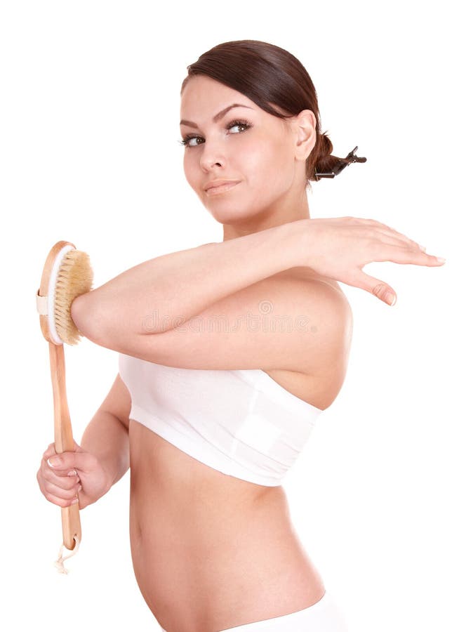 Young woman scrubbing body. stock image