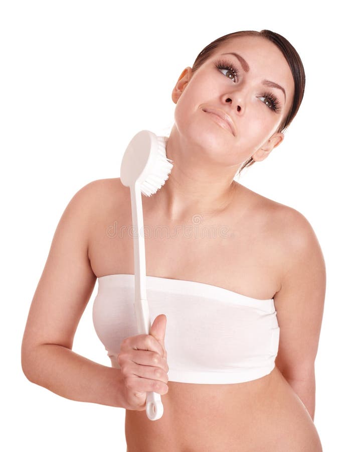 Young woman scrubbing body. royalty free stock photos