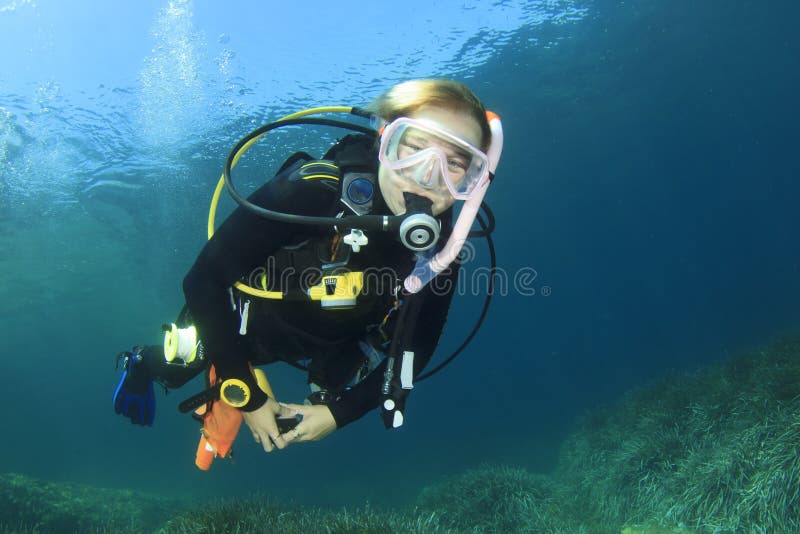 Young woman scuba diving royalty free stock image Young woman scuba diving royalty free stock image