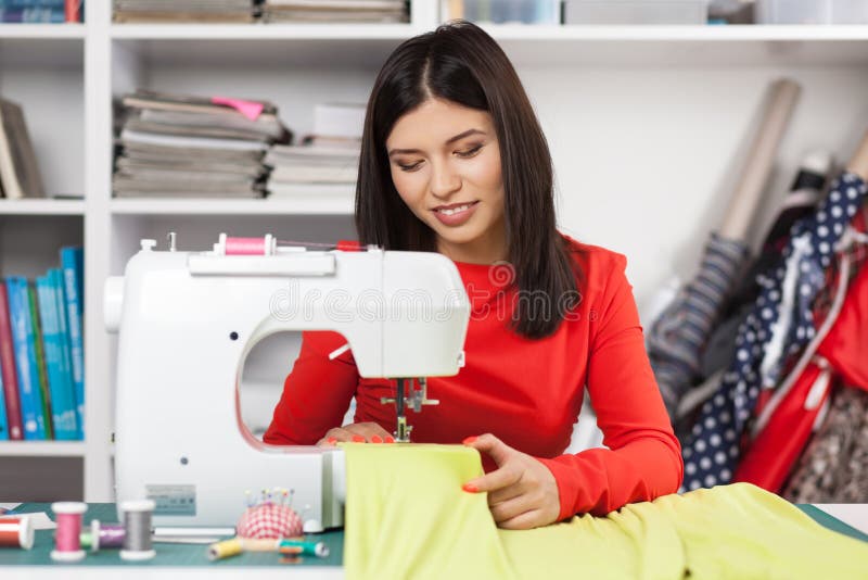 Young Woman at a Sewing Machine Stock Photo Image of fashion, modern