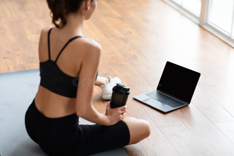 Young Woman Sitting on Mat with Pc Stock Photo - Image of home, practice:  222886288