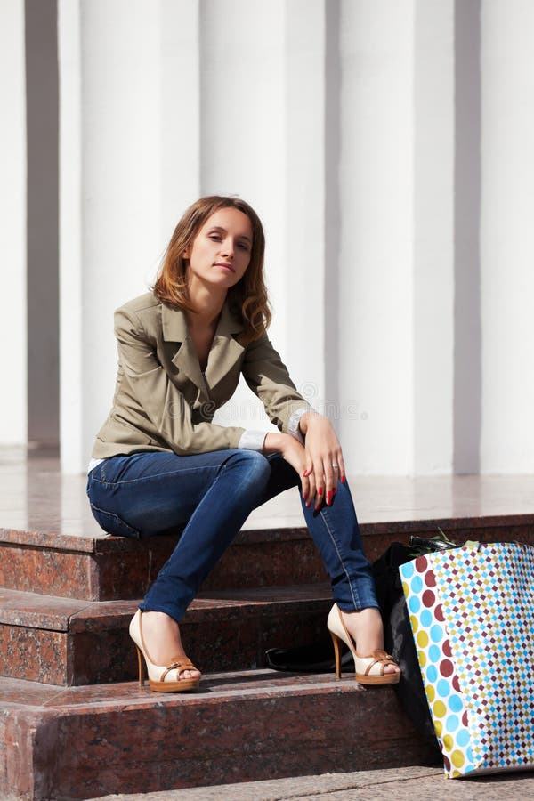 Young Woman Sitting on the Steps Stock Photo - Image of girl ...