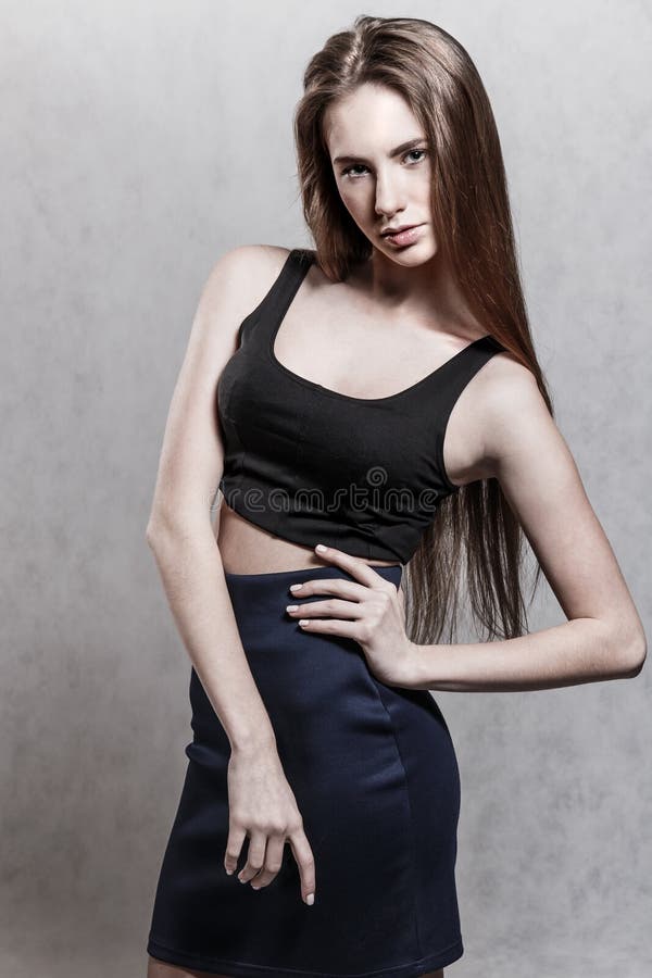 Young woman in a skirt stock image. Image of expressions 90822855