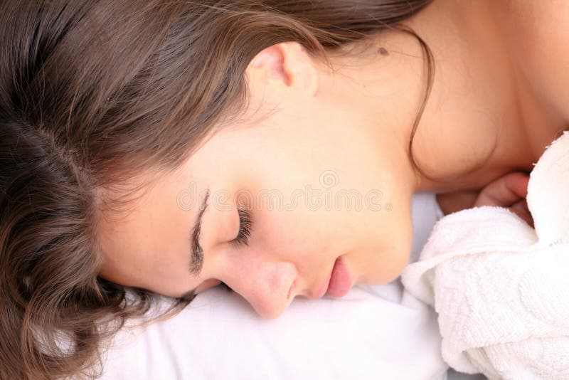 Young woman sleeping stock images