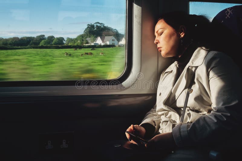 A Young Woman is Sleeping in a Train Carriage Stock Image - Image of ...