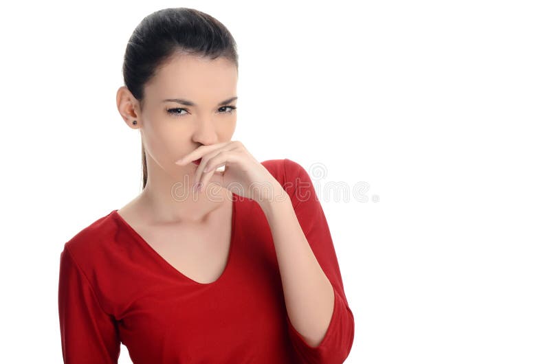 Young woman smelling something bad. Dissgusting odor. stock photography Young woman smelling something bad. Dissgusting odor. stock photography
