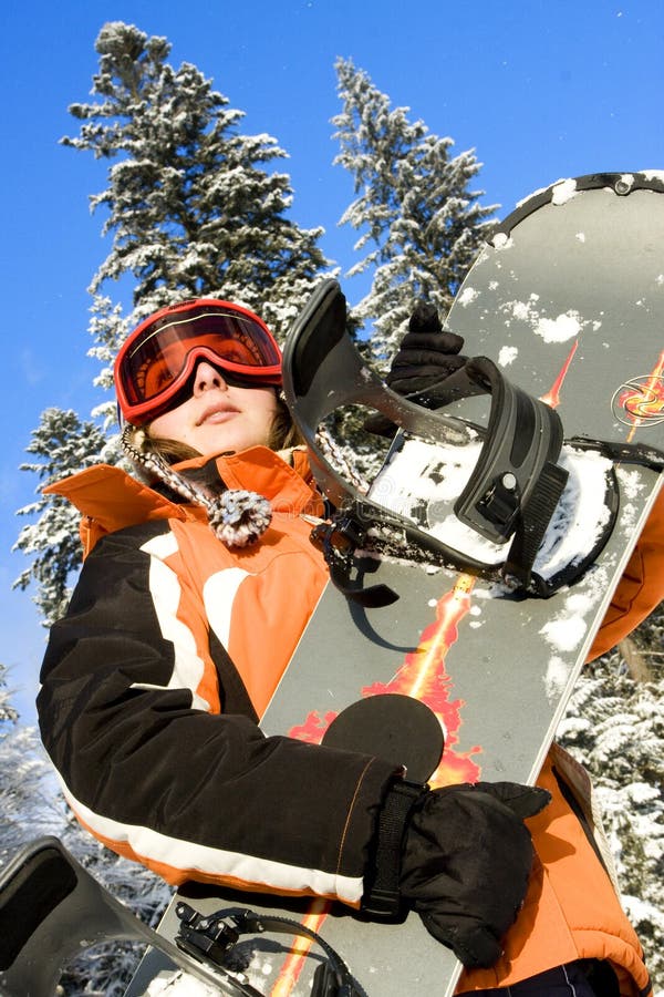 Young woman snowboarder