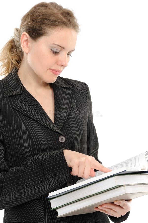 Young woman specifies a finger in the book