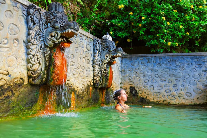 Woman in natural hot spring Air Panas Banjar on Bali