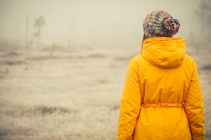 Young Woman standing alone outdoor Travel Lifestyle