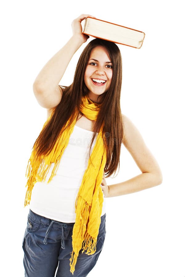 Young woman (student) with book on her head