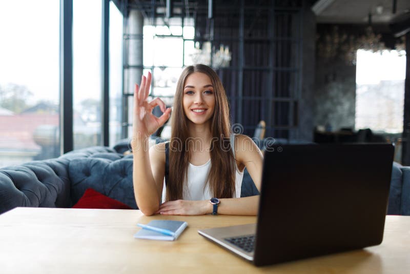 Young woman student working on her laptop in the restaurant . stock image Young woman student working on her laptop in the restaurant . stock image