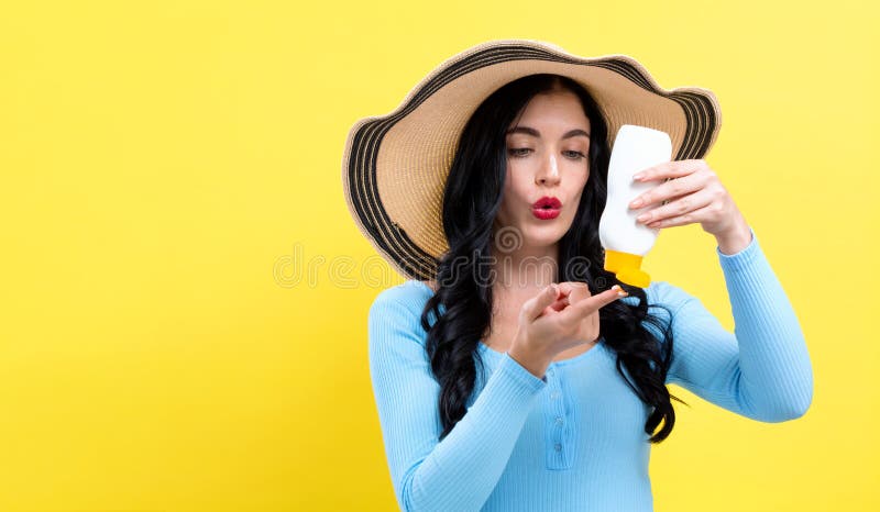 Young woman with sunscreen royalty free stock image Young woman with sunscreen royalty free stock image