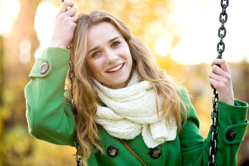 Young woman on swing stock photos