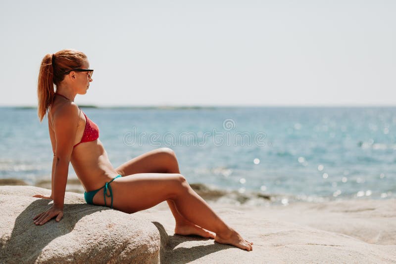 Young Woman Tanning On The Beach Stock Image Image Of Alone Lying