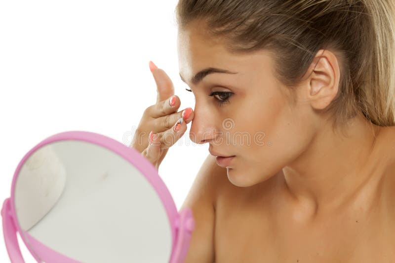 Woman touching her nose