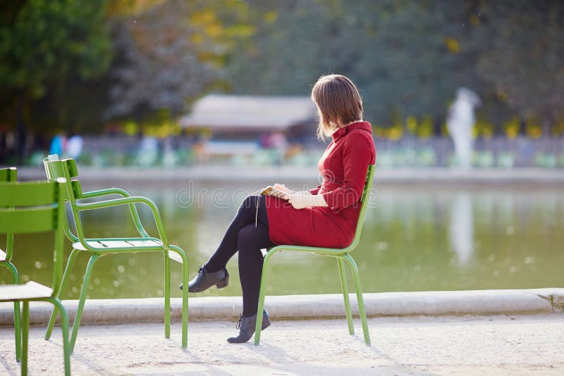 Young woman in Tuileries garden of Paris, France royalty free stock photography Young woman in Tuileries garden of Paris, France royalty free stock photography