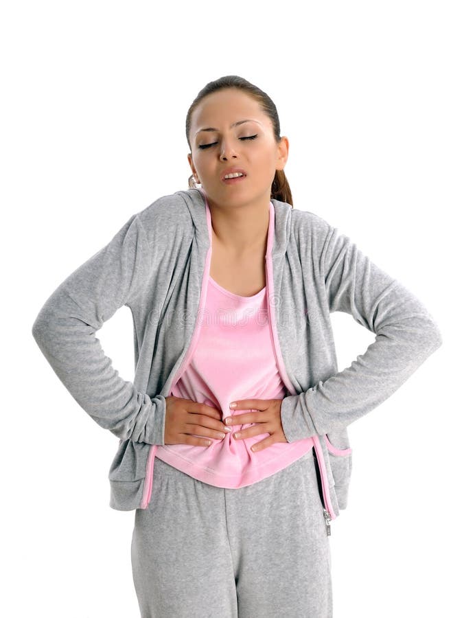Woman holding her stomach with her hands. attractive young women tummyache. Spasm ache stock images, royalty-free photos and pictures