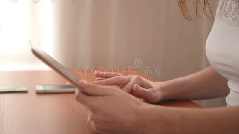 Young woman use a tablet computer