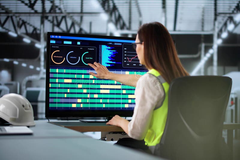Young woman using advanced robotic arm stock photography