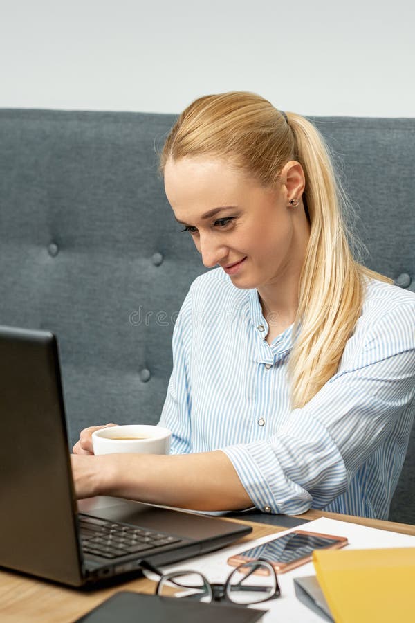 Woman is Working on Laptop at Home Office Stock Image - Image of ...