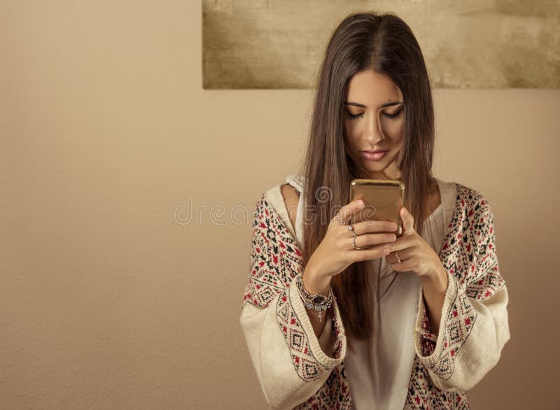 Young woman using a mobile phone stock images Young woman using a mobile phone stock images