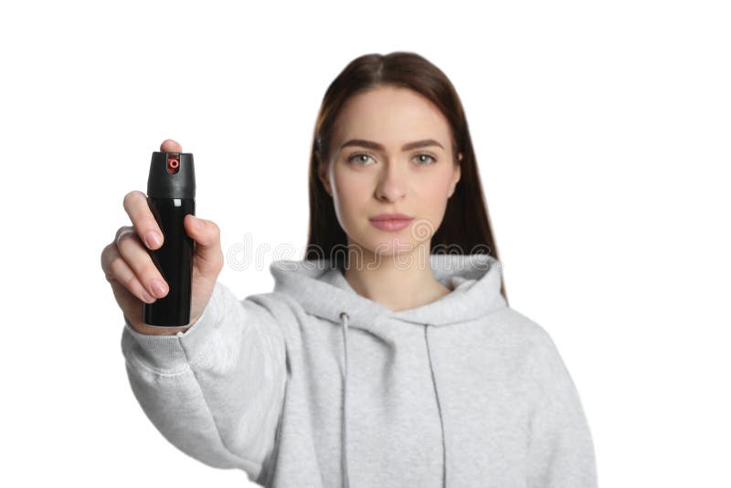 Young Woman Using Pepper Spray on White Background Stock Image Image