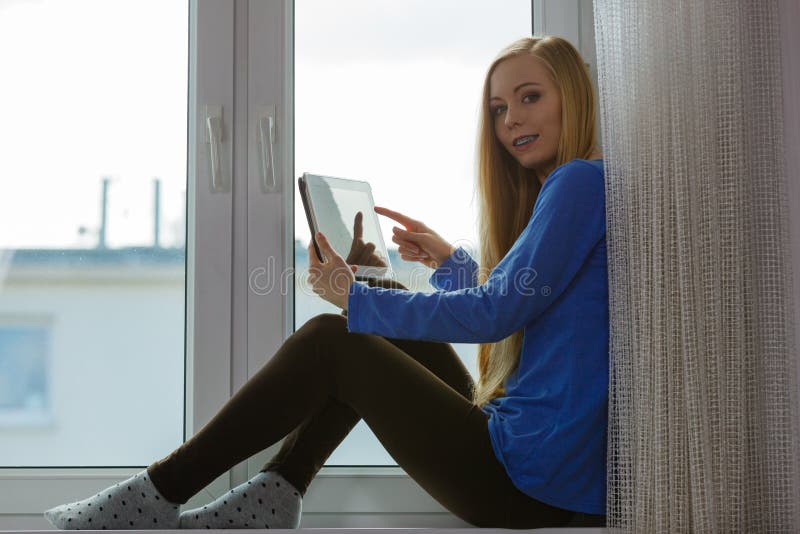 Young woman using tablet royalty free stock image