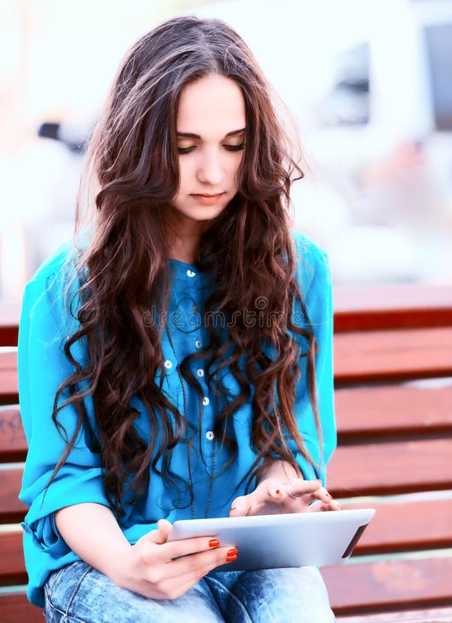 Young woman using tablet