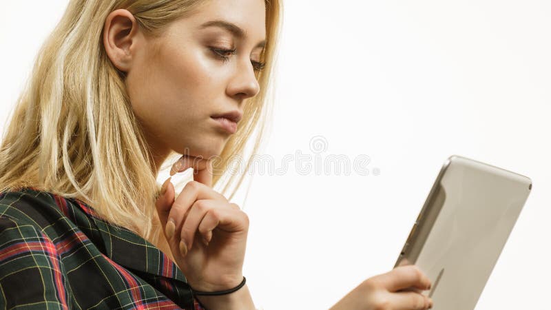 Young woman using tablet royalty free stock photos