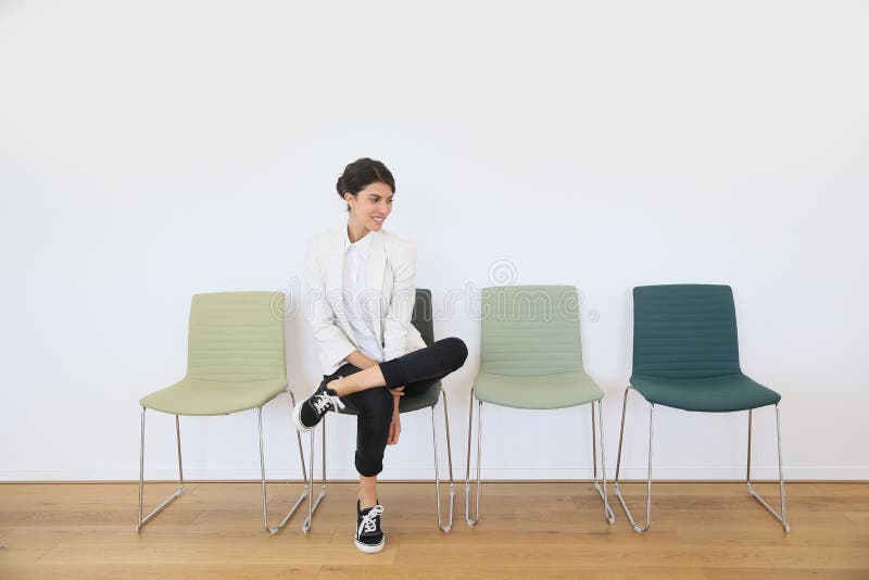 Young woman in waiting room royalty free stock photography Young woman in waiting room royalty free stock photography