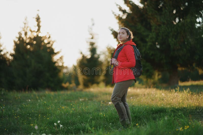 Young Woman on a Walk Outdoors on Meadow in Summer Nature, Walking ...