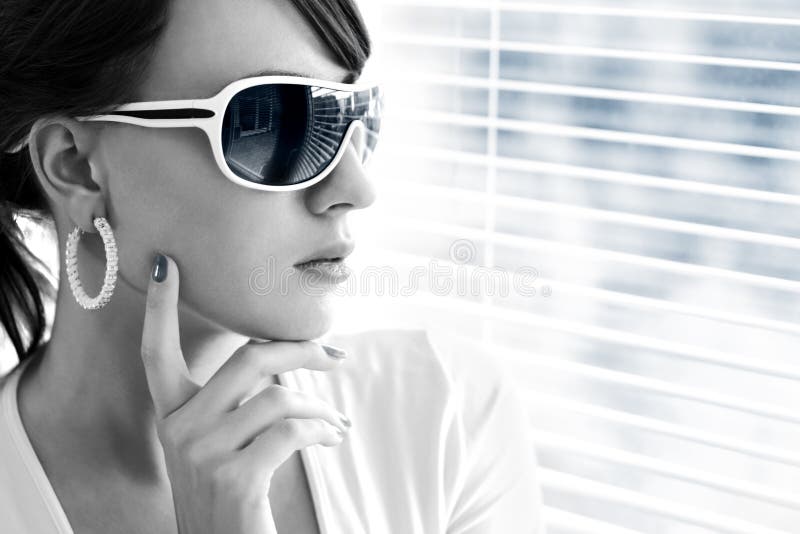 Young woman wearing sunglasses