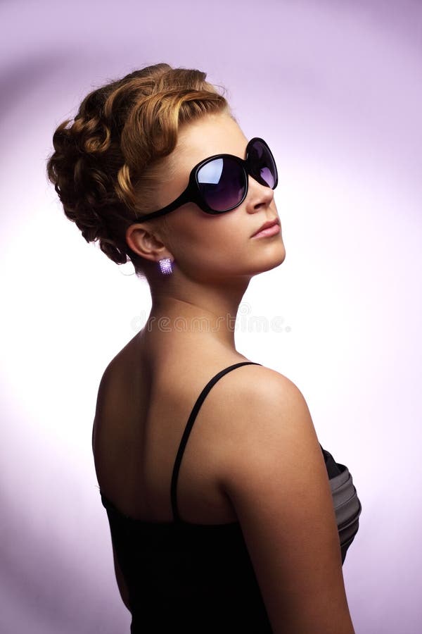 Young woman wearing sunglasses