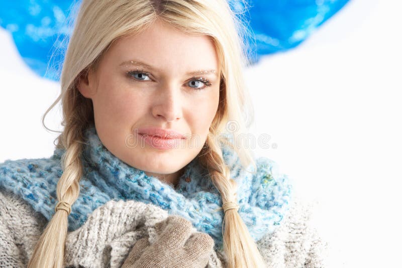 Pretty Young Woman Wearing Warm Winter Clothes In Studio. Winter woolen clothes stock images, royalty-free photos and pictures