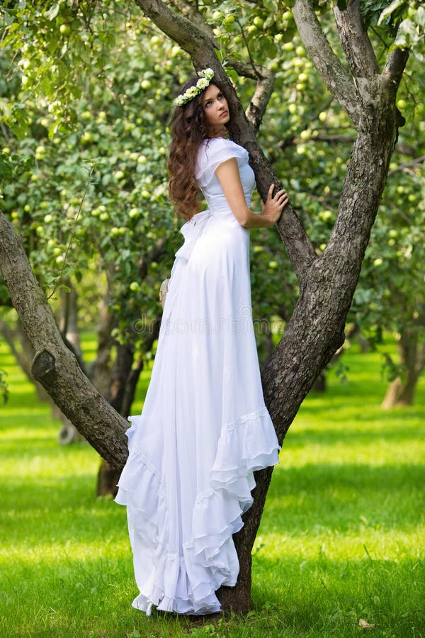 Young woman in a white dress