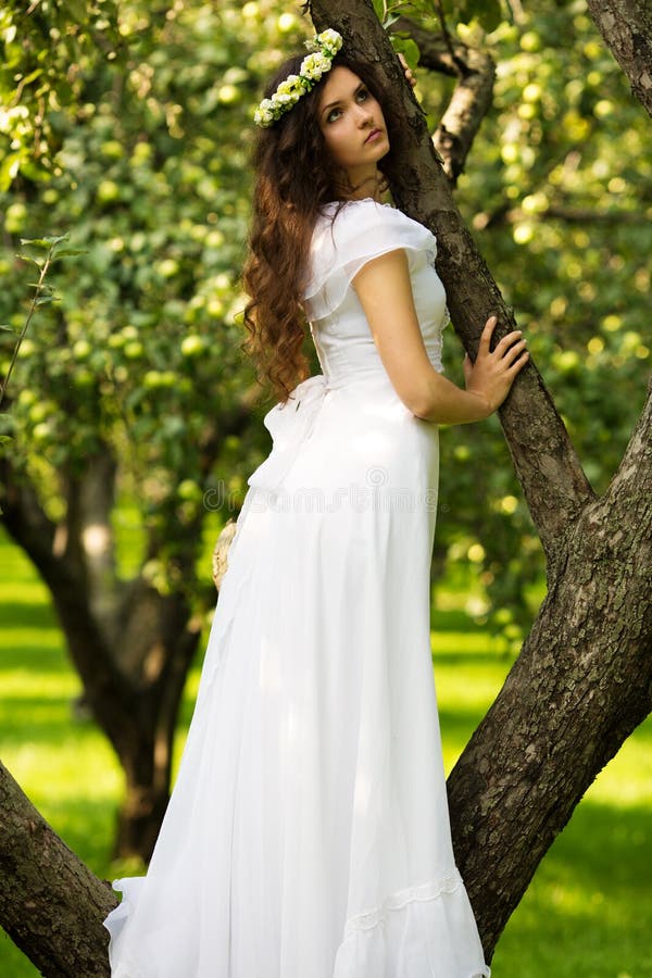 Young woman in a white dress