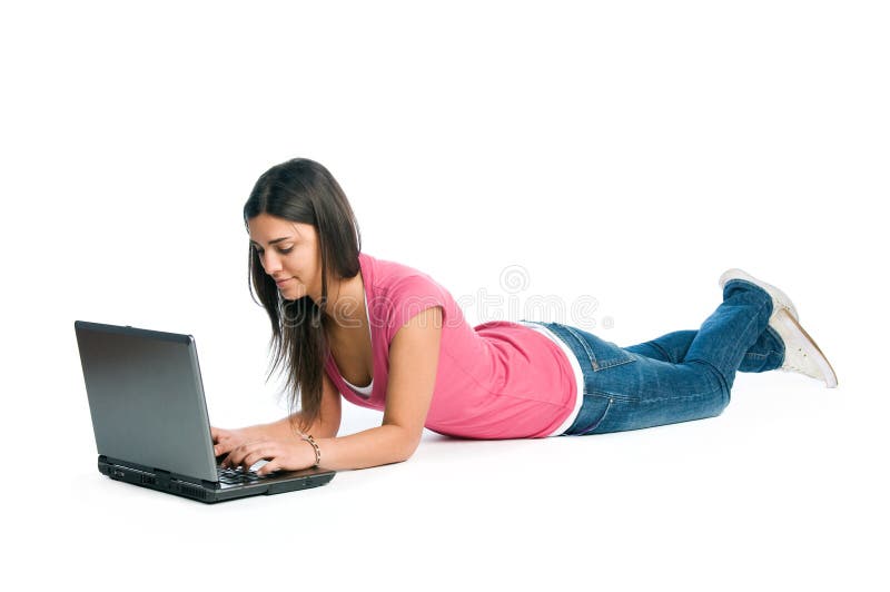 Happy young latin woman working absorbed at her laptop isolated on white background. Happy young latin woman working absorbed at her laptop isolated on white background