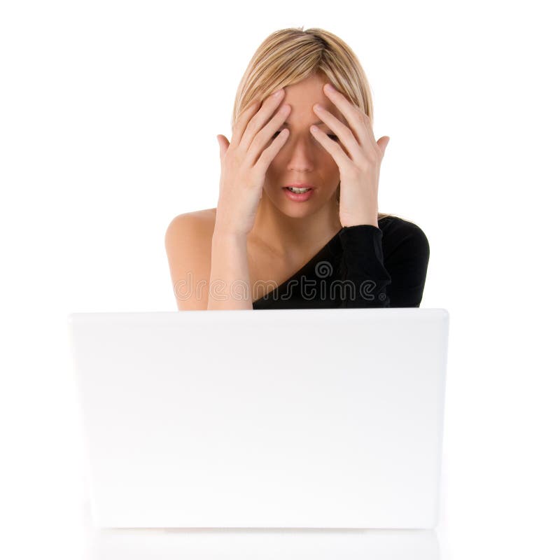 Young woman worried about laptop