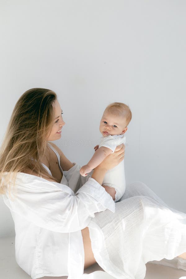 Young Beautiful Blonde Mother Breastfeeding Her Stock Photo 1064021588